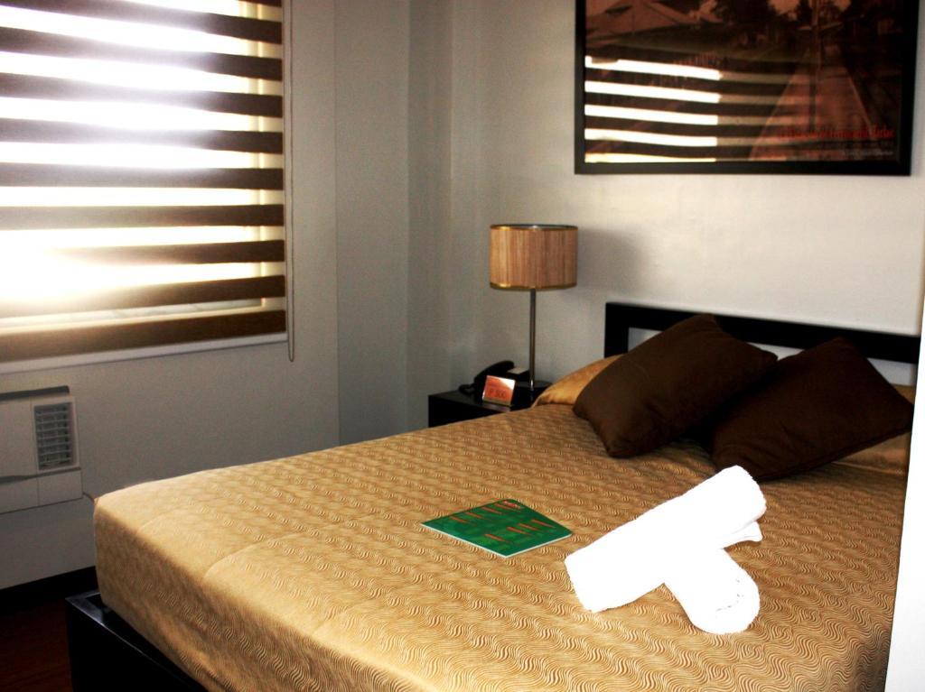 L Square Hotel Tarlac City Quarto foto